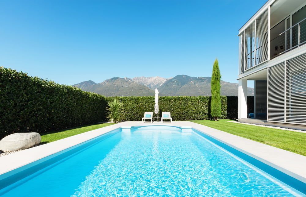 A Spacious House With A Large Swimming Pool — Solitary Island Pools in Nambucca Heads, NSW
