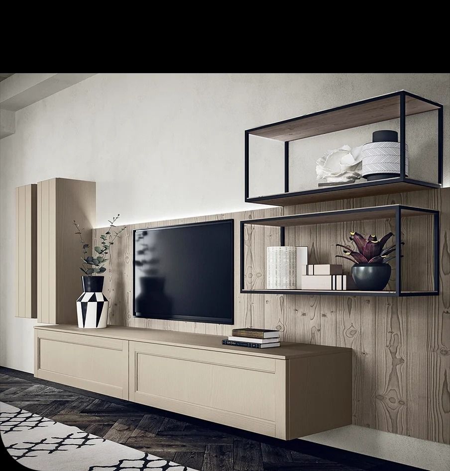 Soggiorno moderno con mobile TV beige, mensole a muro e decorazioni geometriche nere.