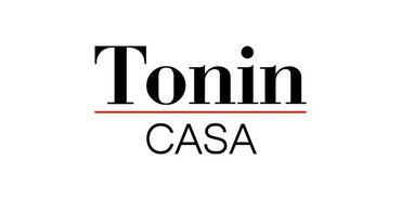 Logo di Tonin Casa in testo nero con sottolineatura rossa su sfondo bianco.