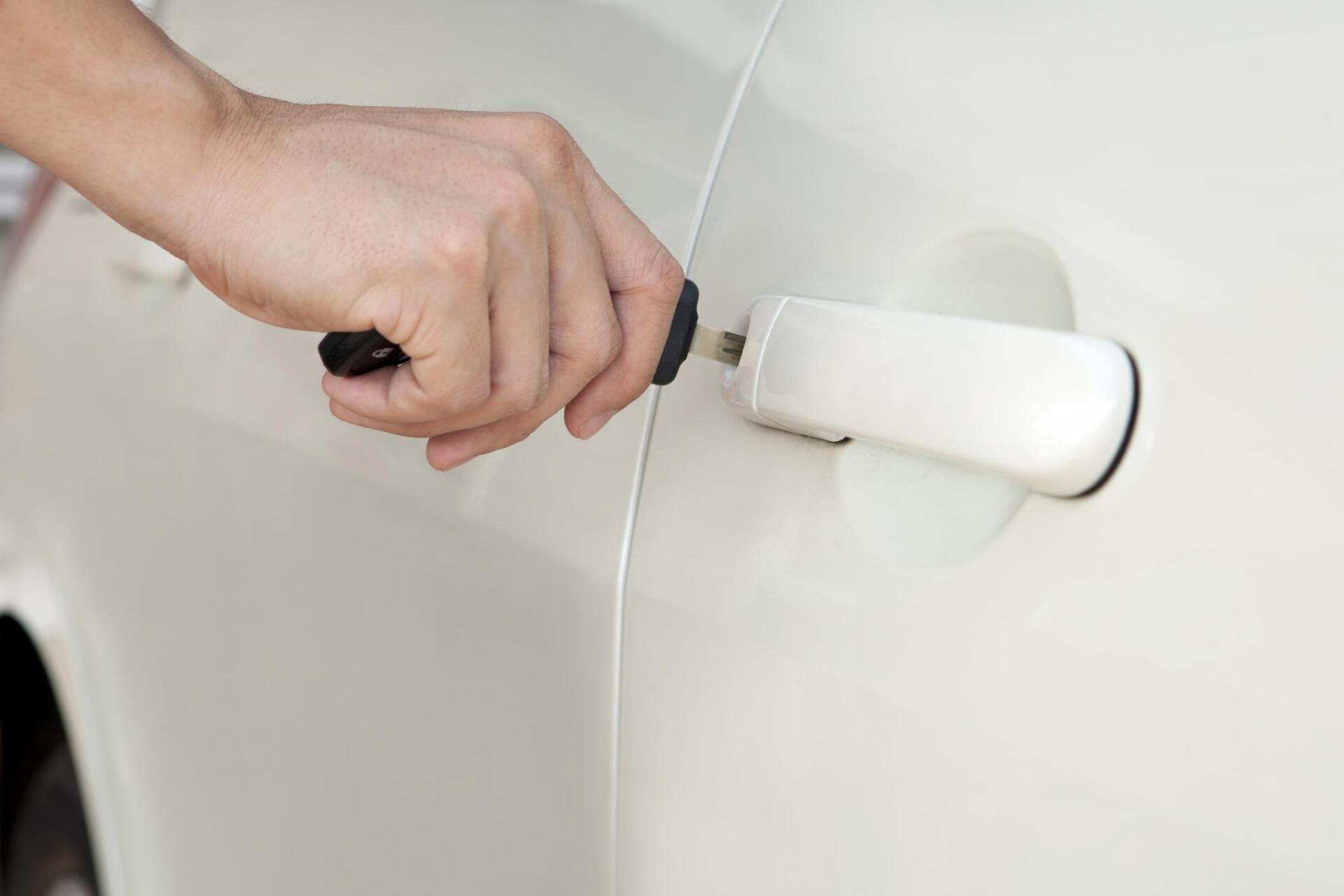 woman opening a car door