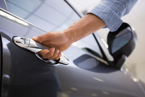 man opening the car door