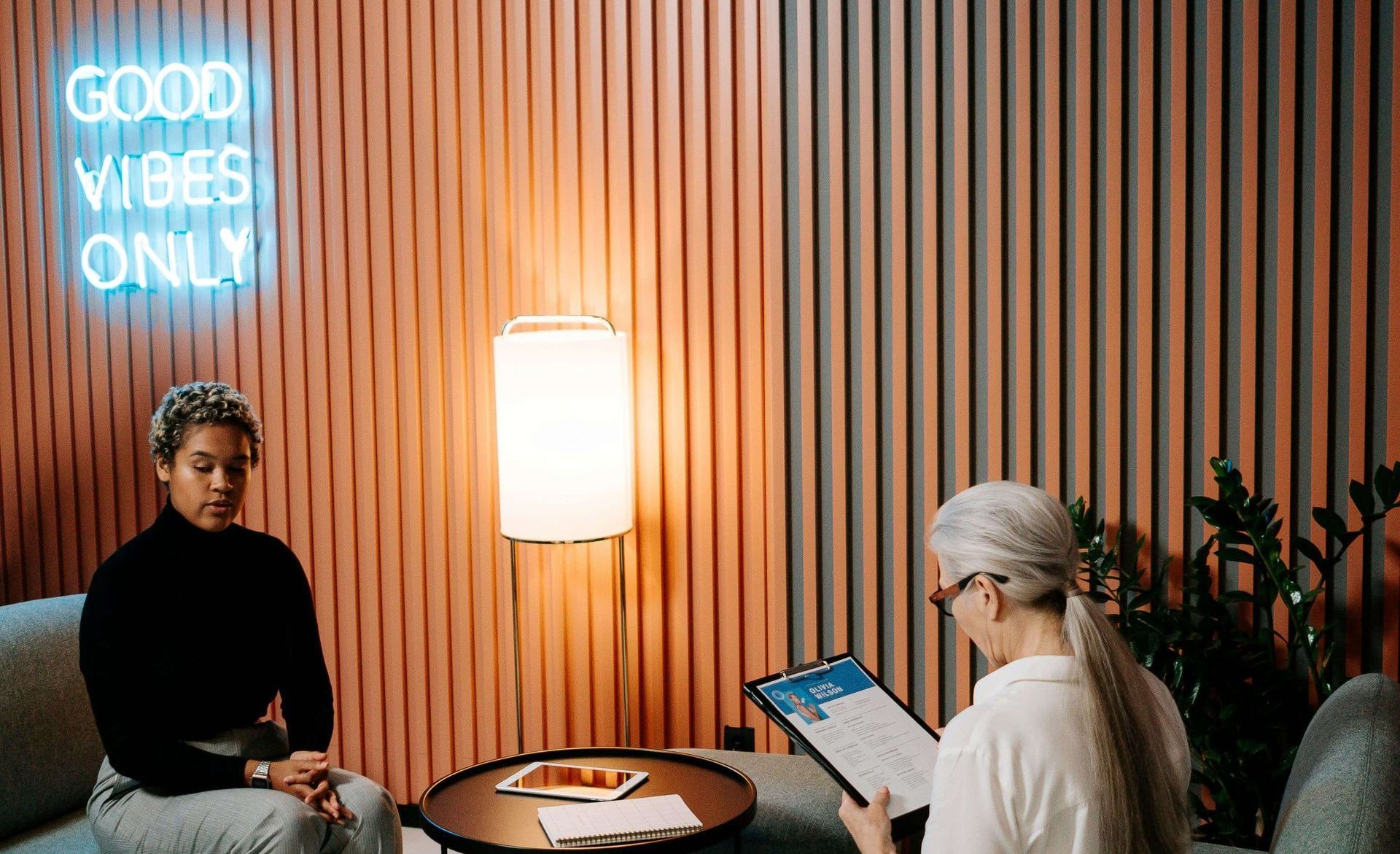 Two people discussing the costs of a bad hire and how to avoid them