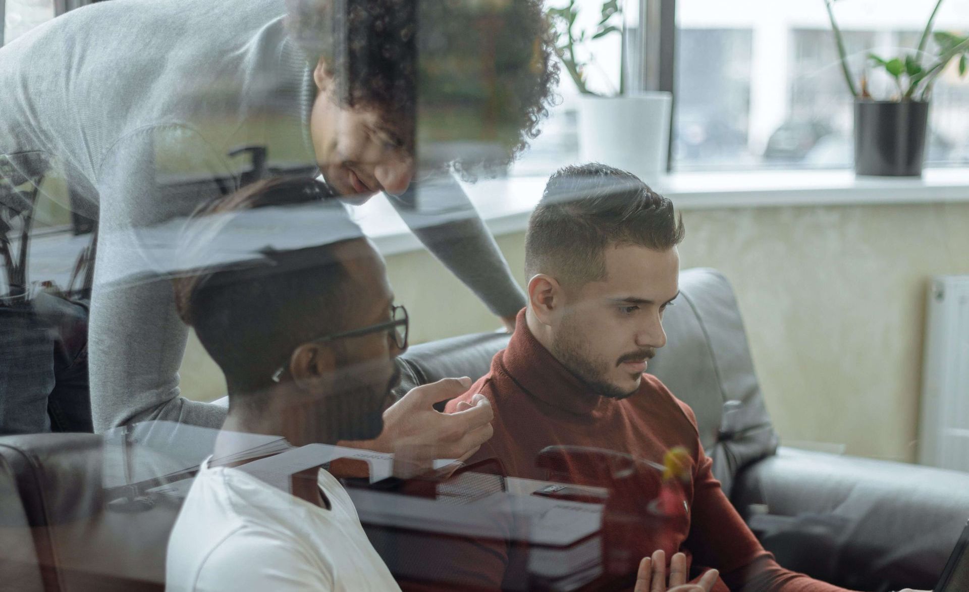A group of men talking about navigating the recruitment tech landscape