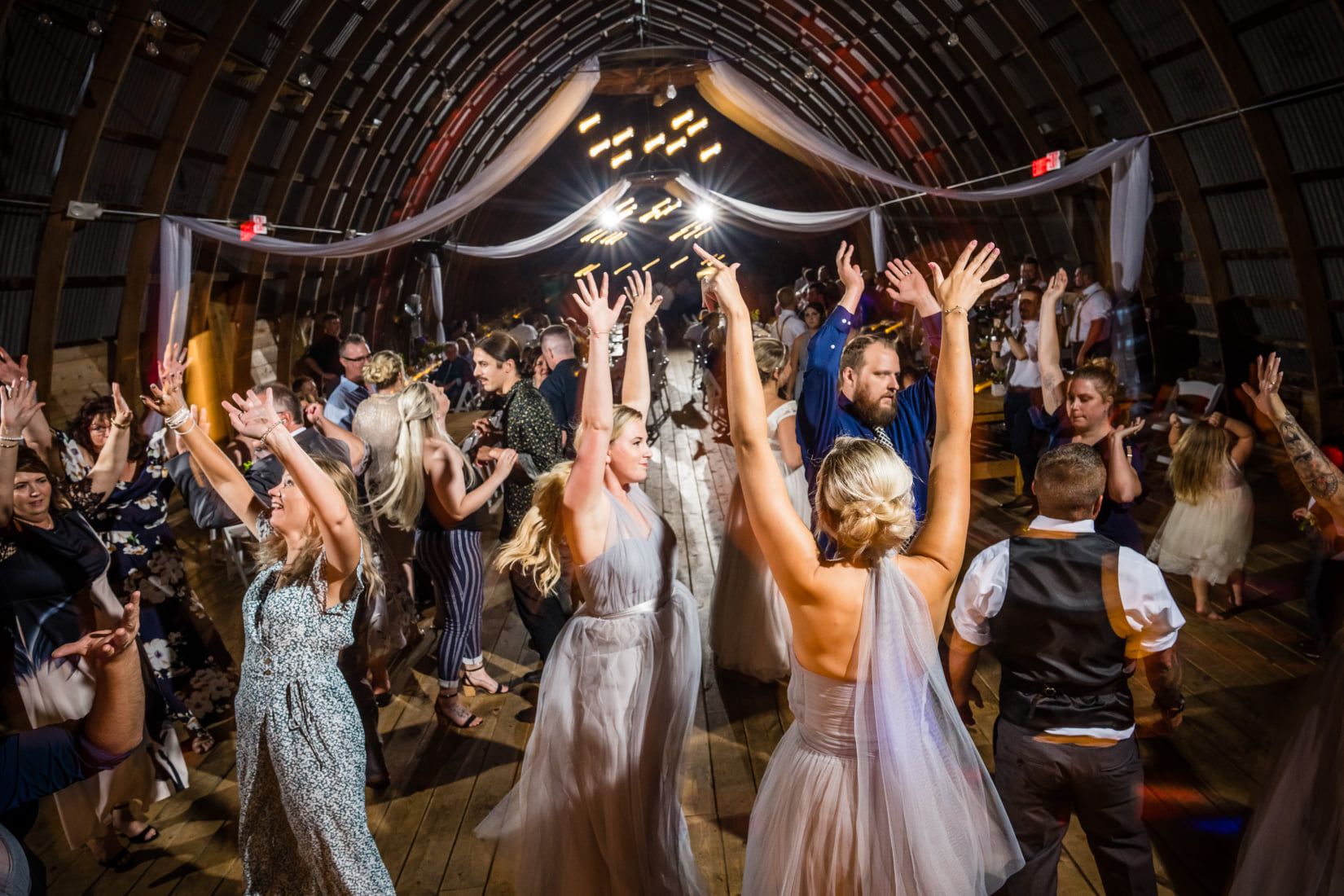 Fun dancing, with Oshkosh DJs, Sound Sensations Entertainment at Poplar Creek Barn.