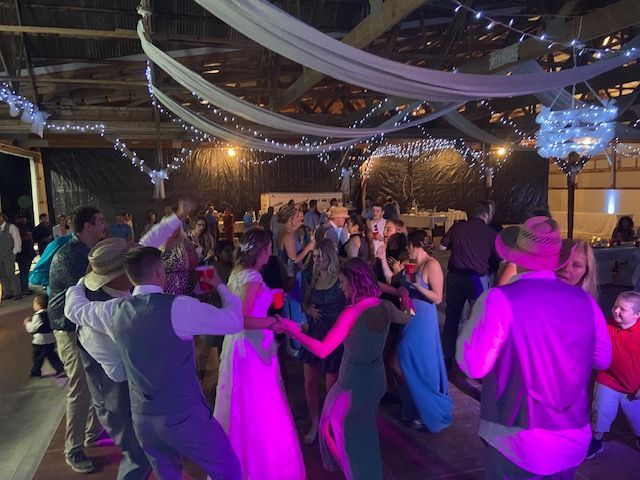 Packed dance floor at a wedding reception on private property in Omro with Sound Sensations Entertainment