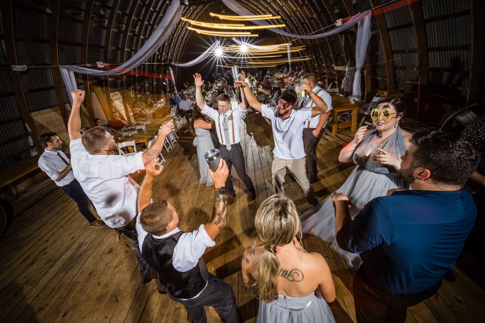 Packed dance floor at Poplar Creek Barn in Oshkosh with Sound Sensations Entertainment