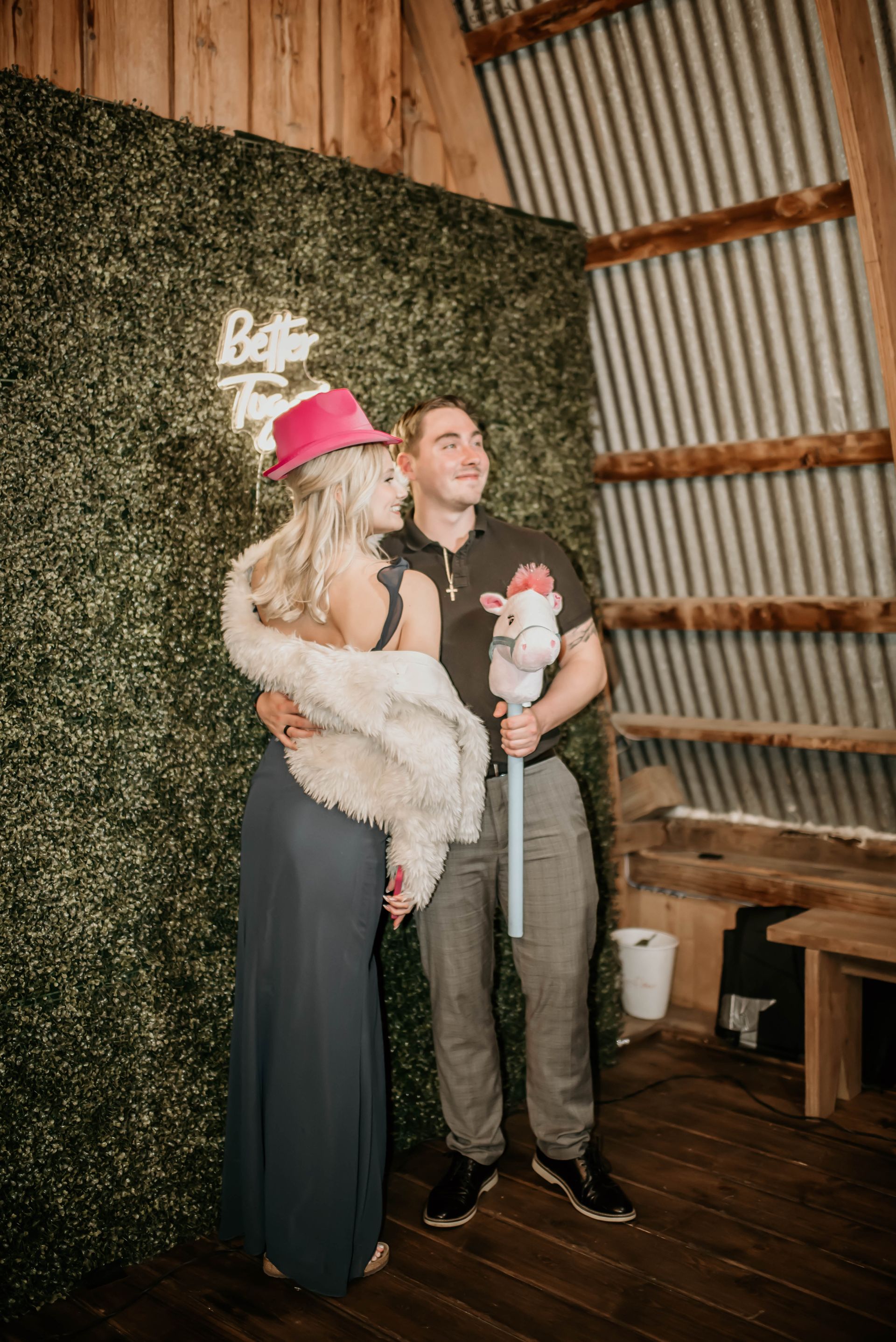 Guests laughing and posing inside a Sound Sensations photo booth at a Fox Cities event
Party guests 