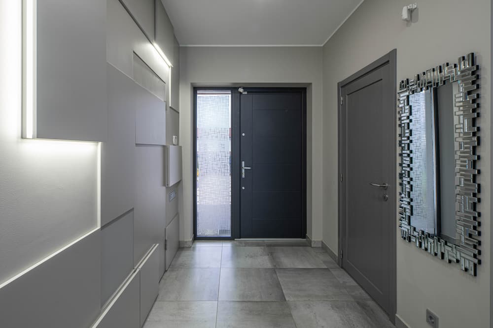 Front metal door from the inside of an apartment.