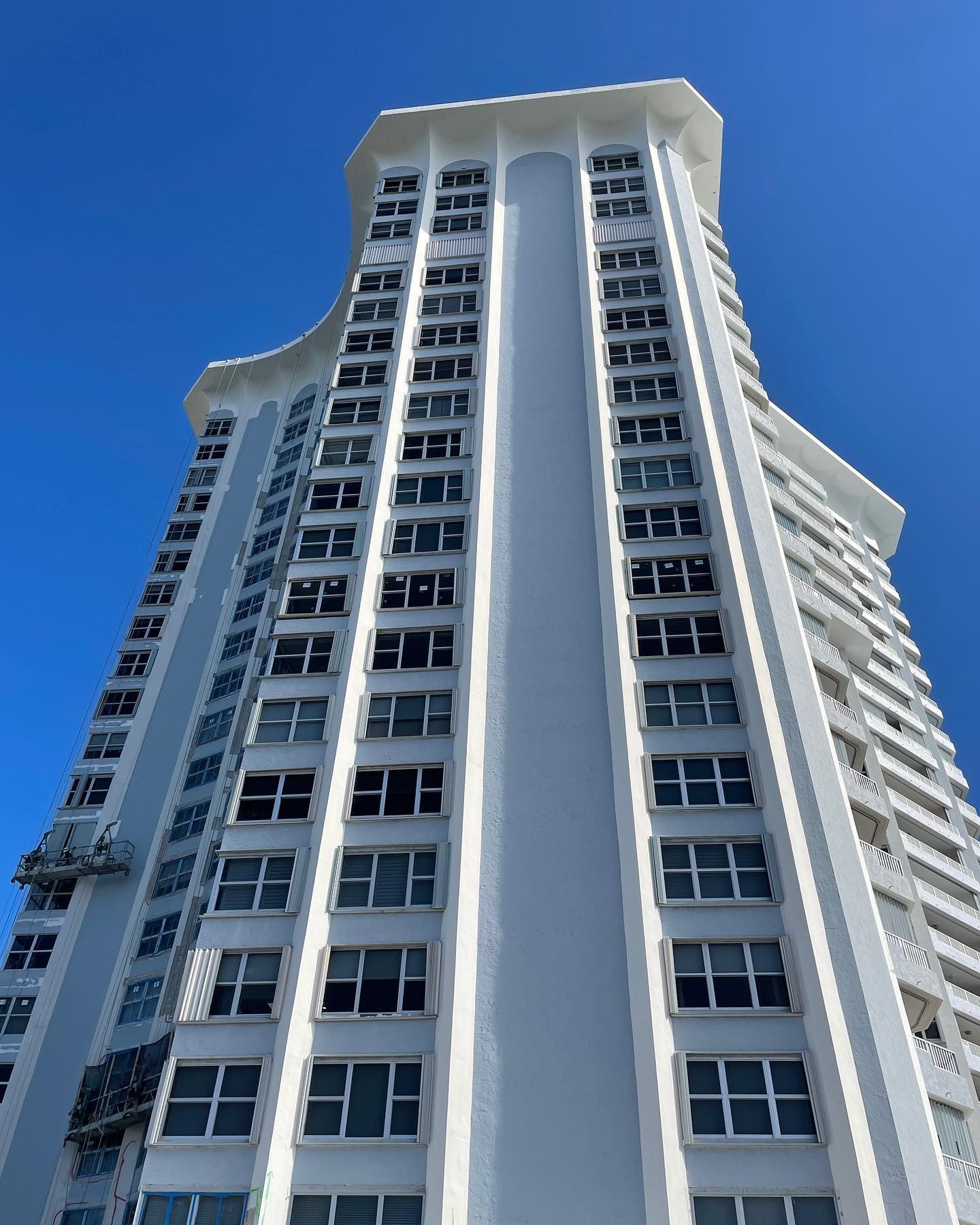 Commercial impact windows on a residential building.