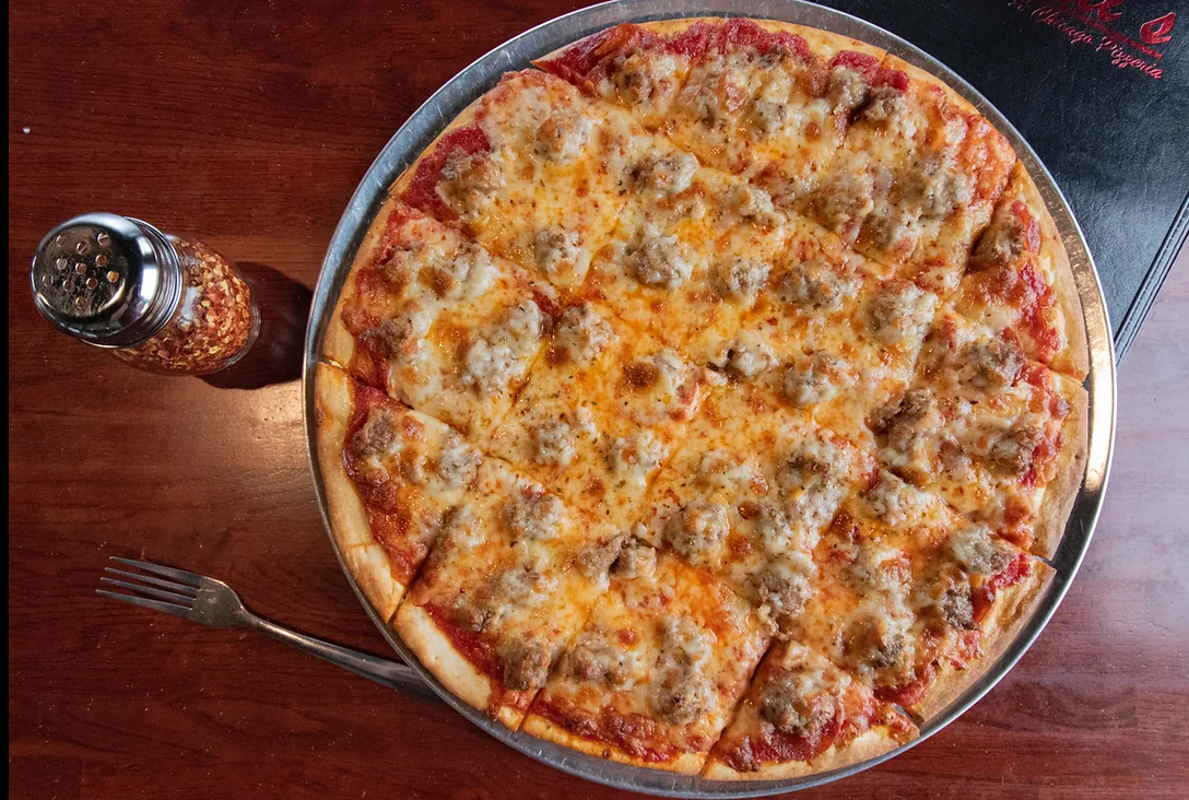 roselli's is my husbands favorite pizza place. he says they have the best thin crust