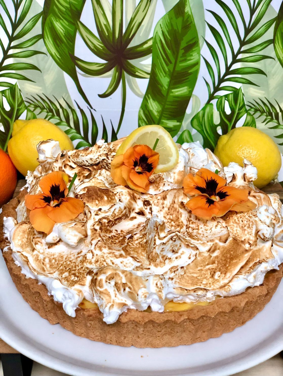 A Single Layer Cake, Browned Meringue Topping, Yellow Lemons, Orange Flowers — Flour in Yeppoon, QLD