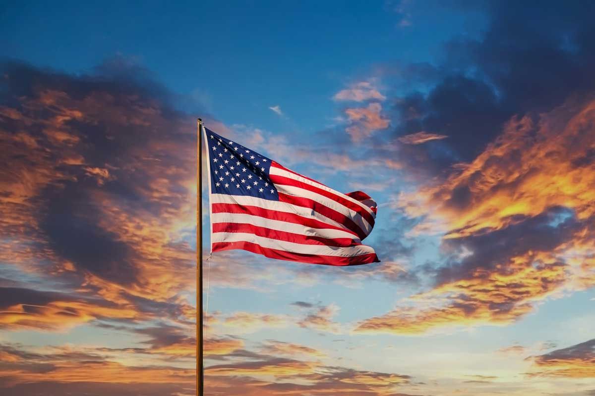 Stylized torn American flag with stars and red stripes