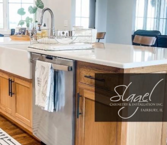 Bright modern kitchen with wood island, white countertops, sink, and stainless steel dishwasher