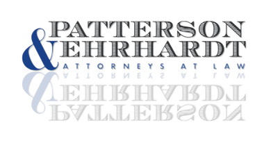 Logo for Patterson & Ehrhardt, Attorneys at Law, featuring text in blue and gray with reflection.