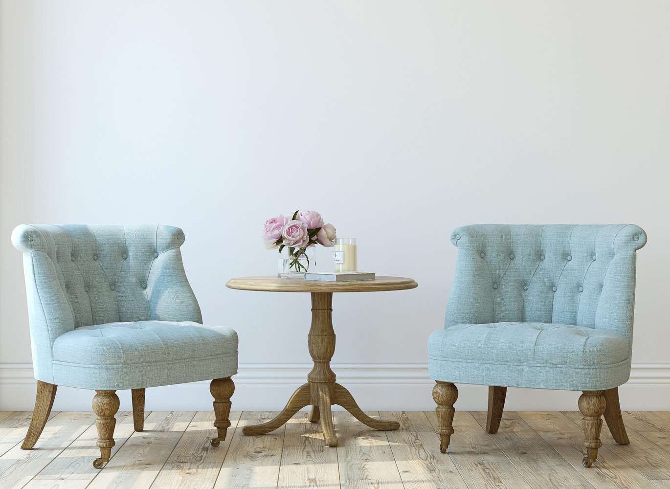 There are two chairs and a table in the room.