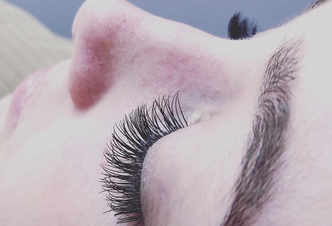 Close-up of a Person's Eye With Long, Dark Eyelashes and a Groomed Eyebrow — Admire Skincare and Beauty in Taree, NSW
