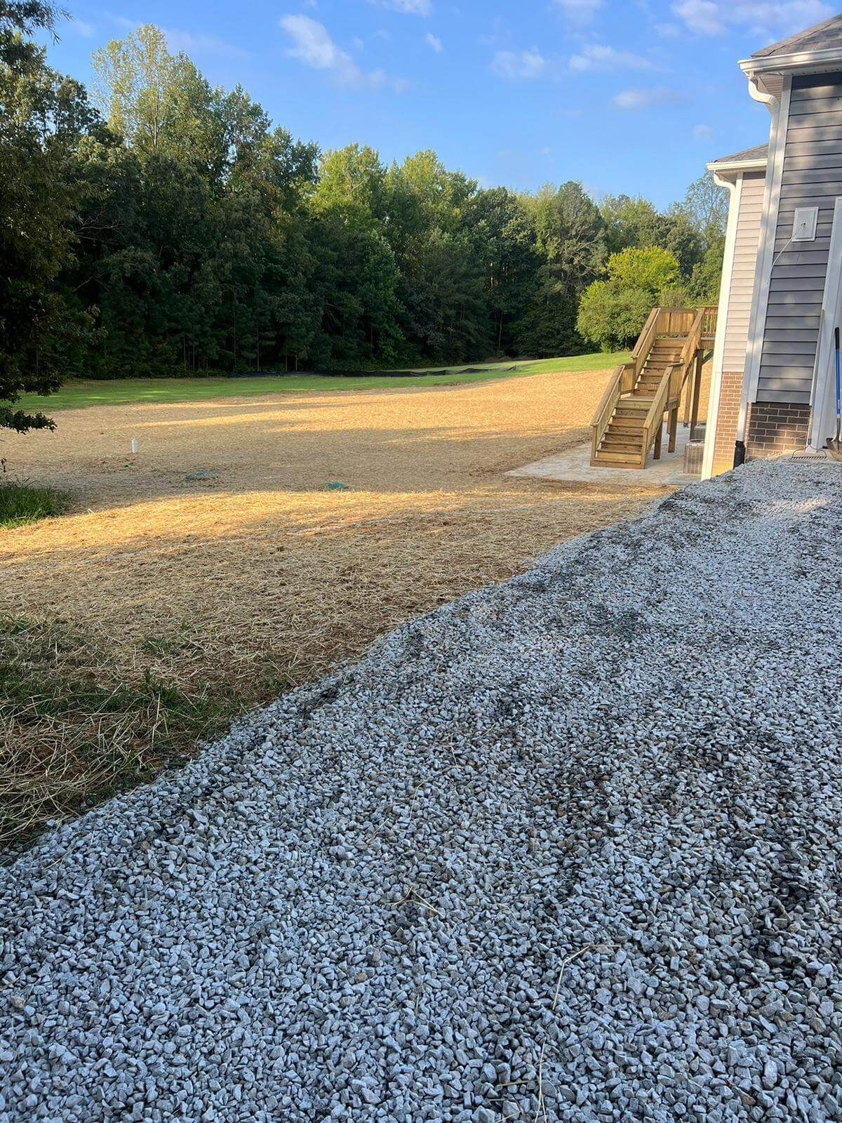 Property grading to improve surface drainage on a Central Virginia property