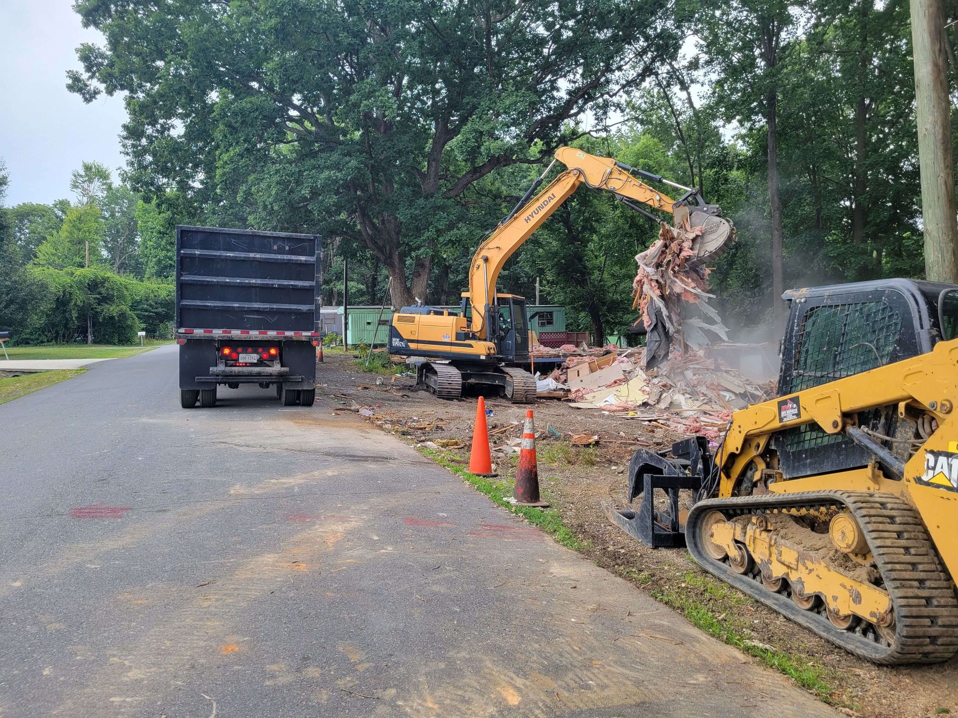 Preparing a construction site for land development using excavators.
