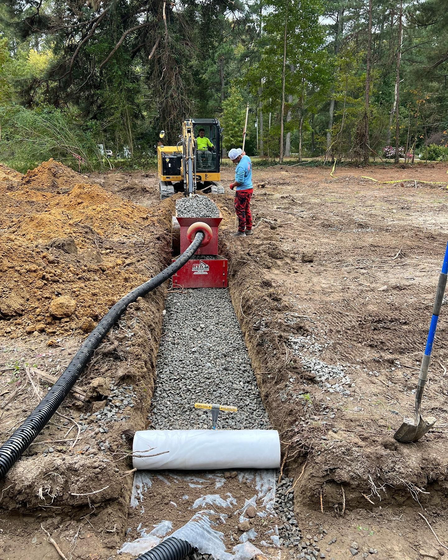 RVA Site Services using trenching equipment to prepare for septic line installation.