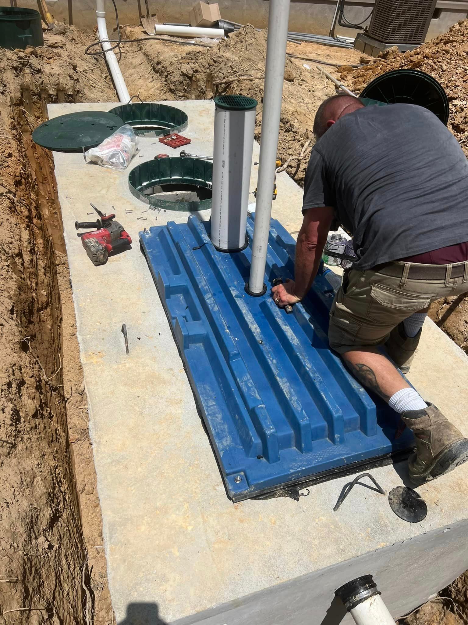 Septic tank being inspected to diagnose a septic system problem