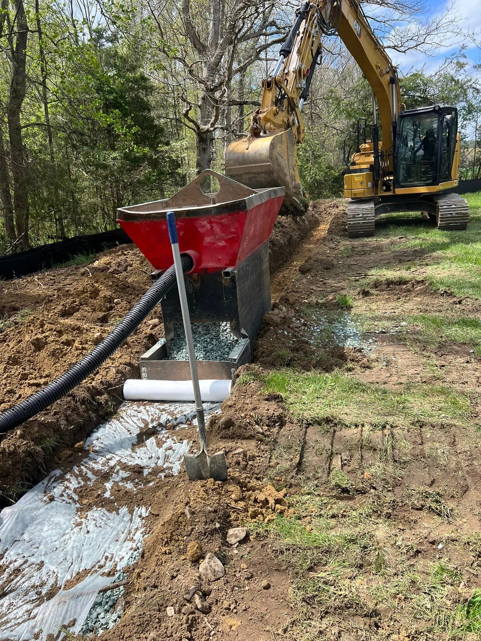 Heavy equipment digging a trench during an excavation project near Richmond, VA