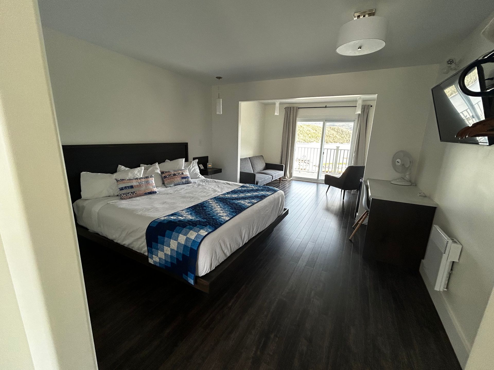 There is a large bed in the middle of the room.