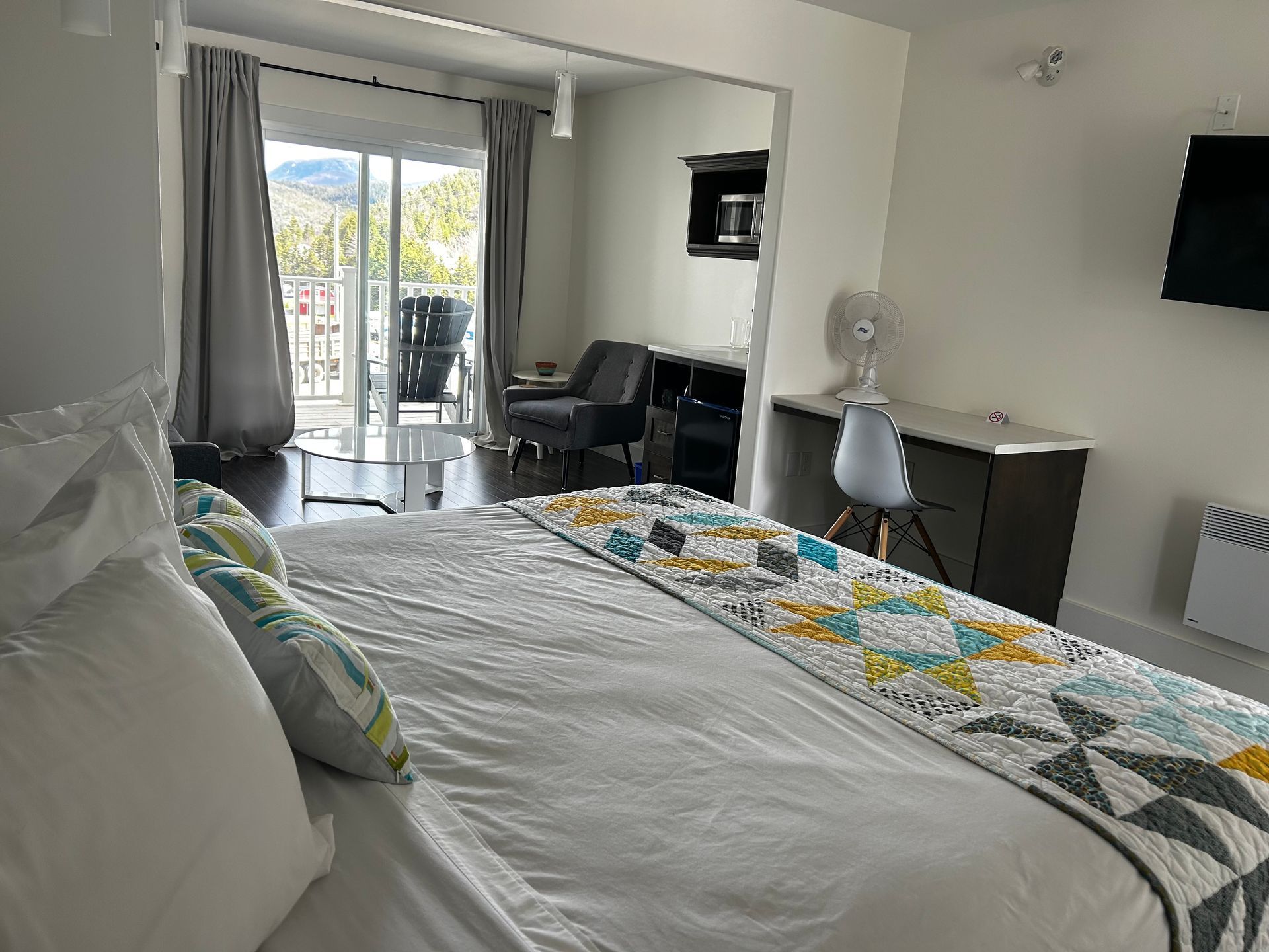 There is a large bed in the middle of the room.
