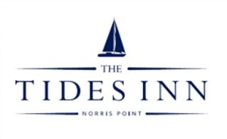 The tide inn norris point logo with a sailboat on it