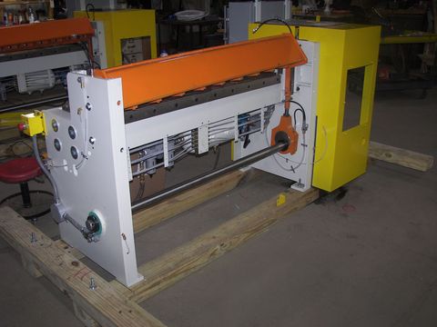 a black and white photo of a machine on a white background .