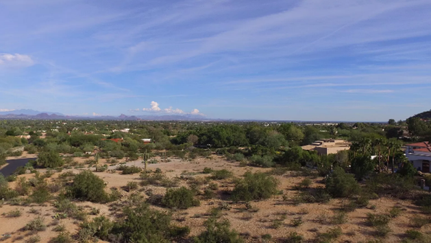Arguably the best view lot in Paradise Valley, this lot boasts views in all directions. This 8000 sq foot custom luxury home will be the envy of the neighborhood featuring one of the largest and most functional pantries and well designed kitchens. The entire home will be designed with healthy living in mind from material choices to mitigating the health impact from wi-fi and cell usage. Cutting edge technologies and building techniques will be employed to address the preferences and to reflect what is important to this wonderful couple.