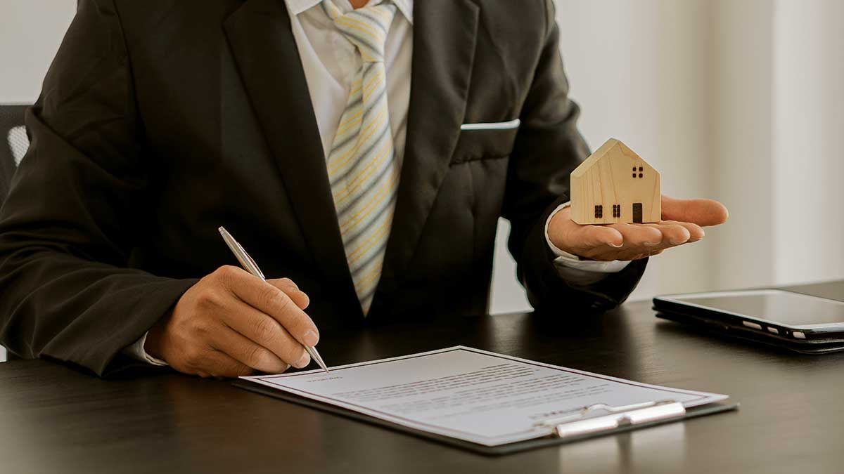 Real Estate Professional Holding Model Home