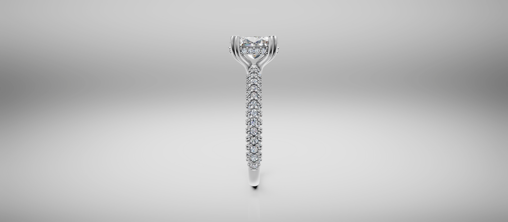 Silver screw with decorative head on a light gray background