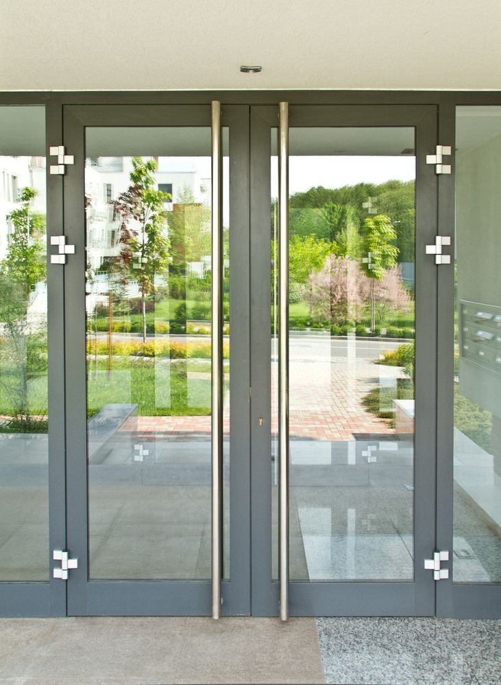 A Pair Of Glass Doors With A Stainless Steel Handle — All About Glass Lake Macquarie In Ellalong, NSW