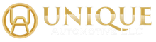 Gold “UNIQUE Automotive” logo with a stylized car emblem on a white background