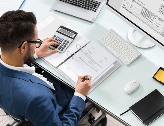 Office Worker Doing Finance Computation — East Stroudsburg, PA — Managed Solutions Office Worker Doing Finance Computation — East Stroudsburg, PA — Managed Solutions