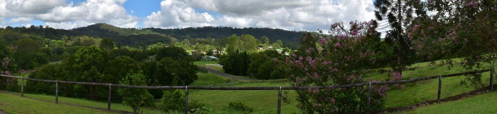 Panorama of Green Field, Trees, and Hills Under a Cloudy Sky — Coast 2 Coast Locksmiths in Nambour, QLD