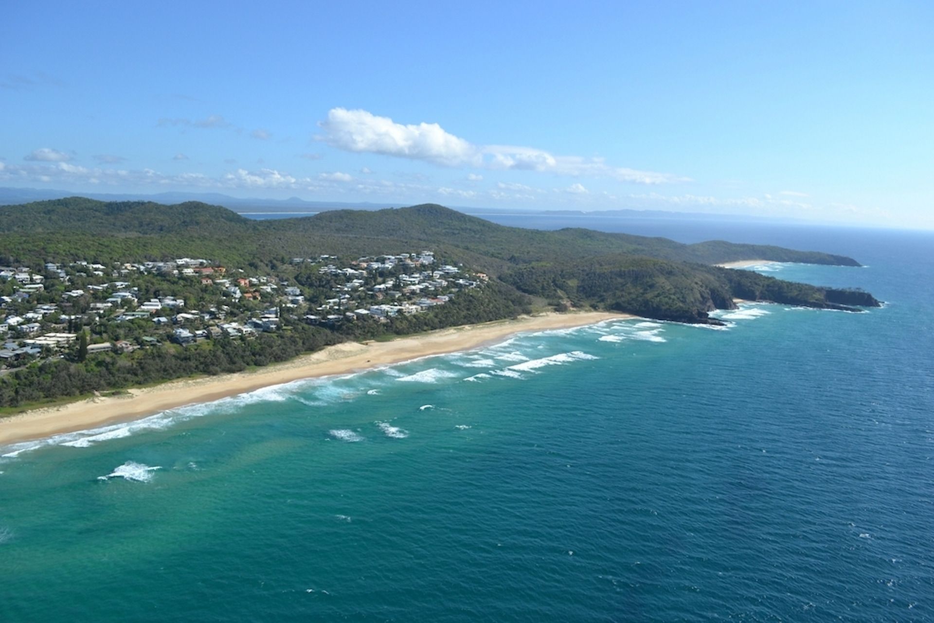 Beachfront Houses Nestled on a Green Hillside — Coast 2 Coast Locksmiths in Peregian Springs, QLD