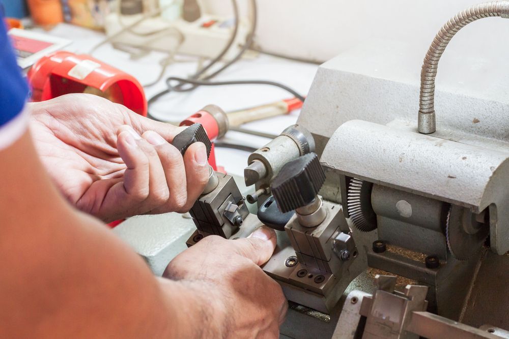 Locksmith in Workshop Makes New Key — Coast 2 Coast Locksmiths in Peregian Springs, QLD