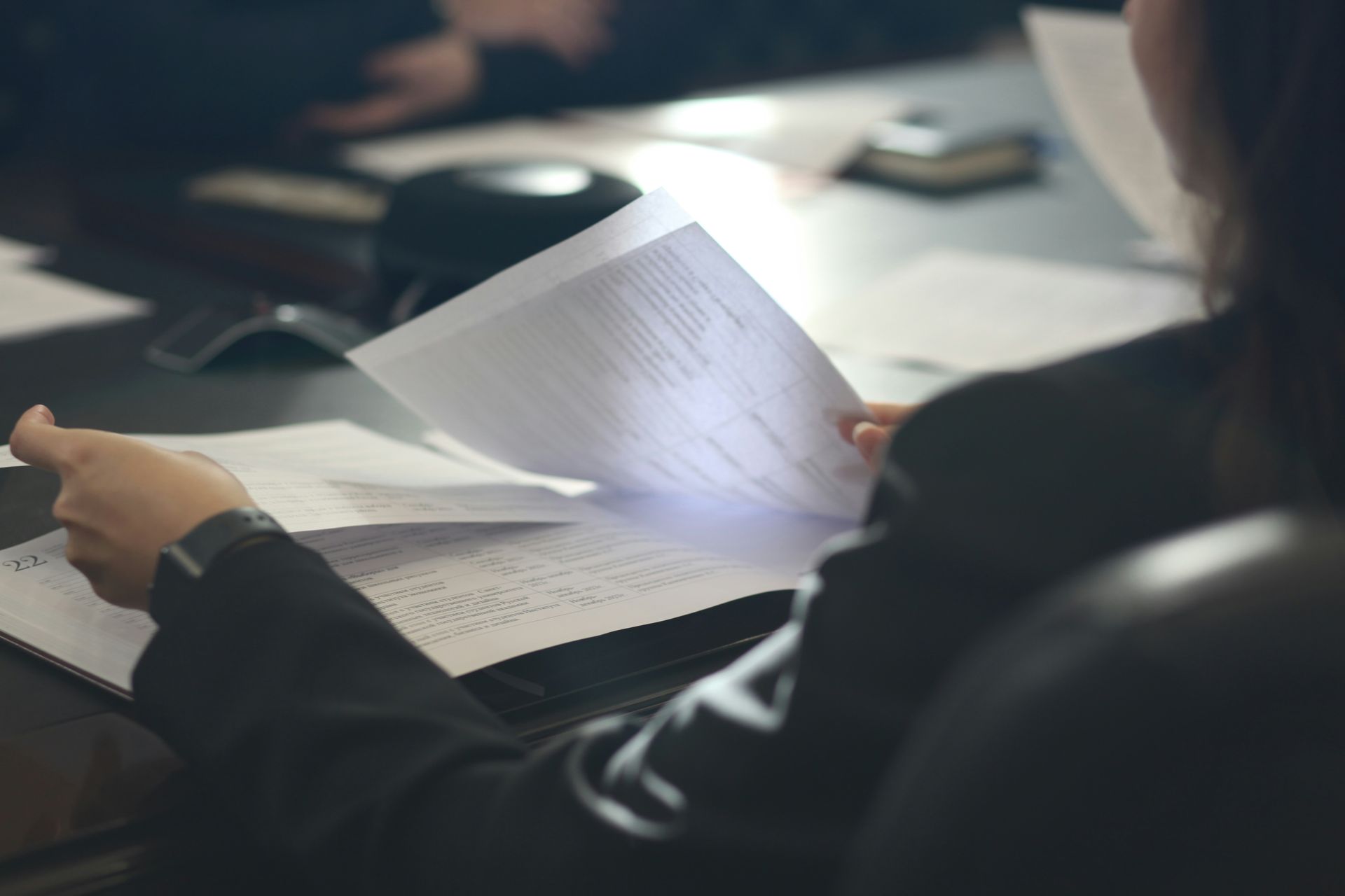 person reviewing documents