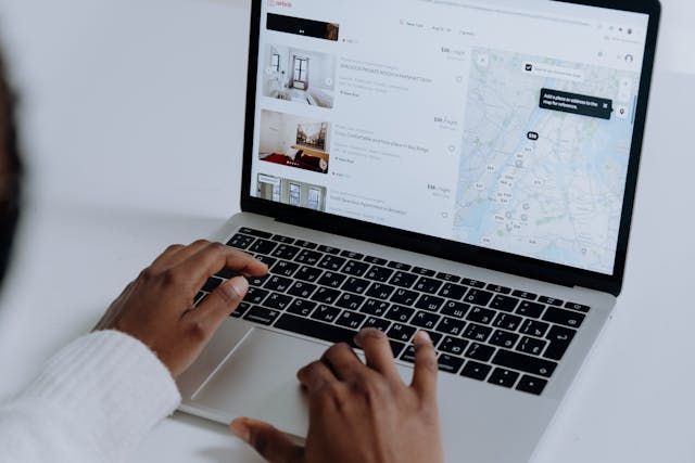 person looking at rental listings