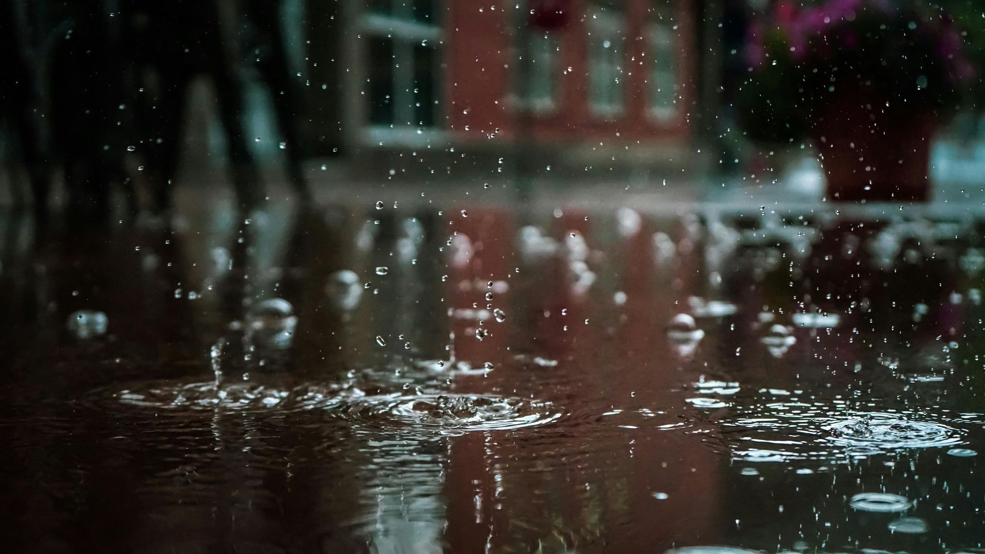 rain drops in puddle