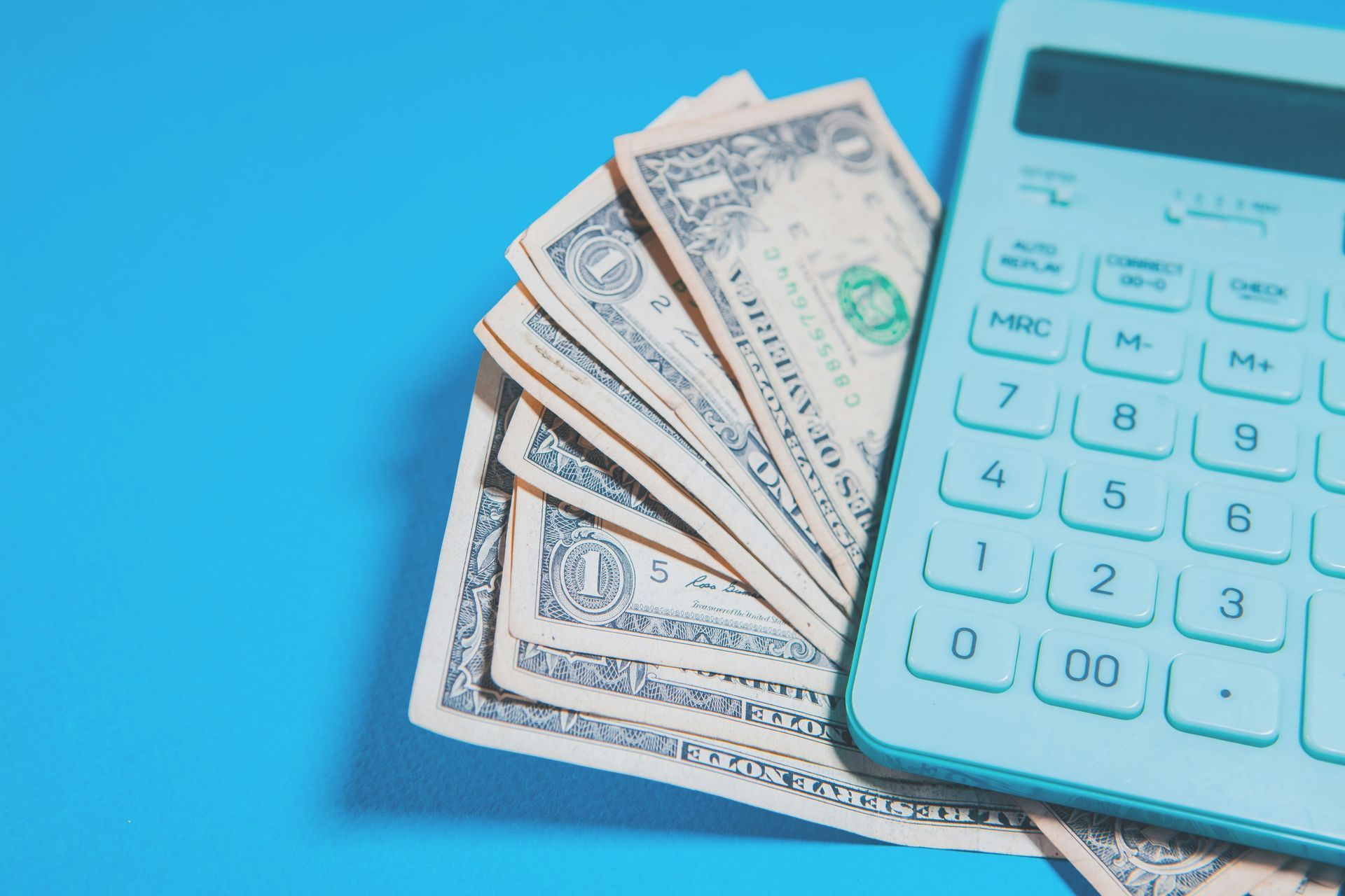 calculator and cash