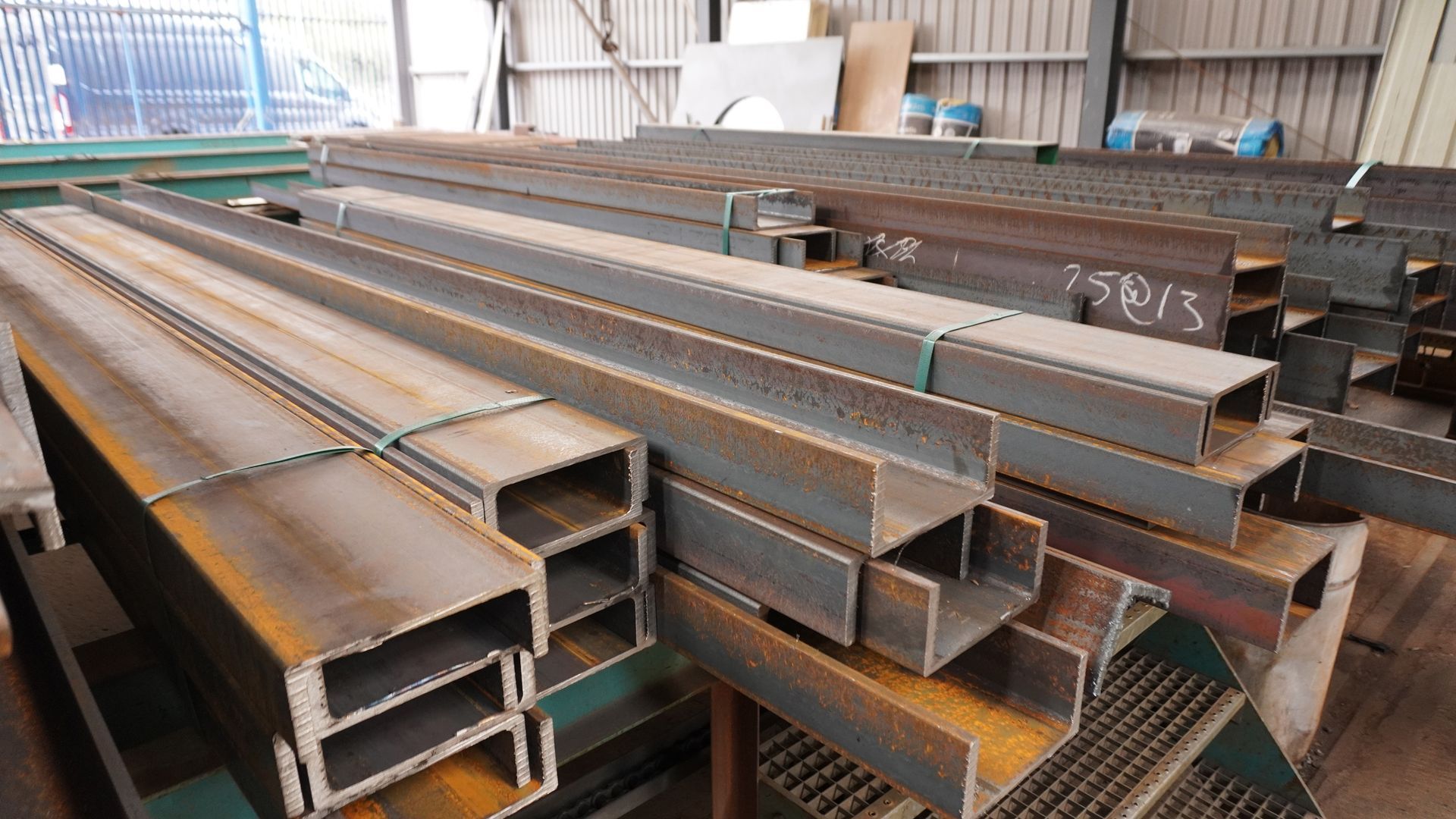 pile of rusty steel beams