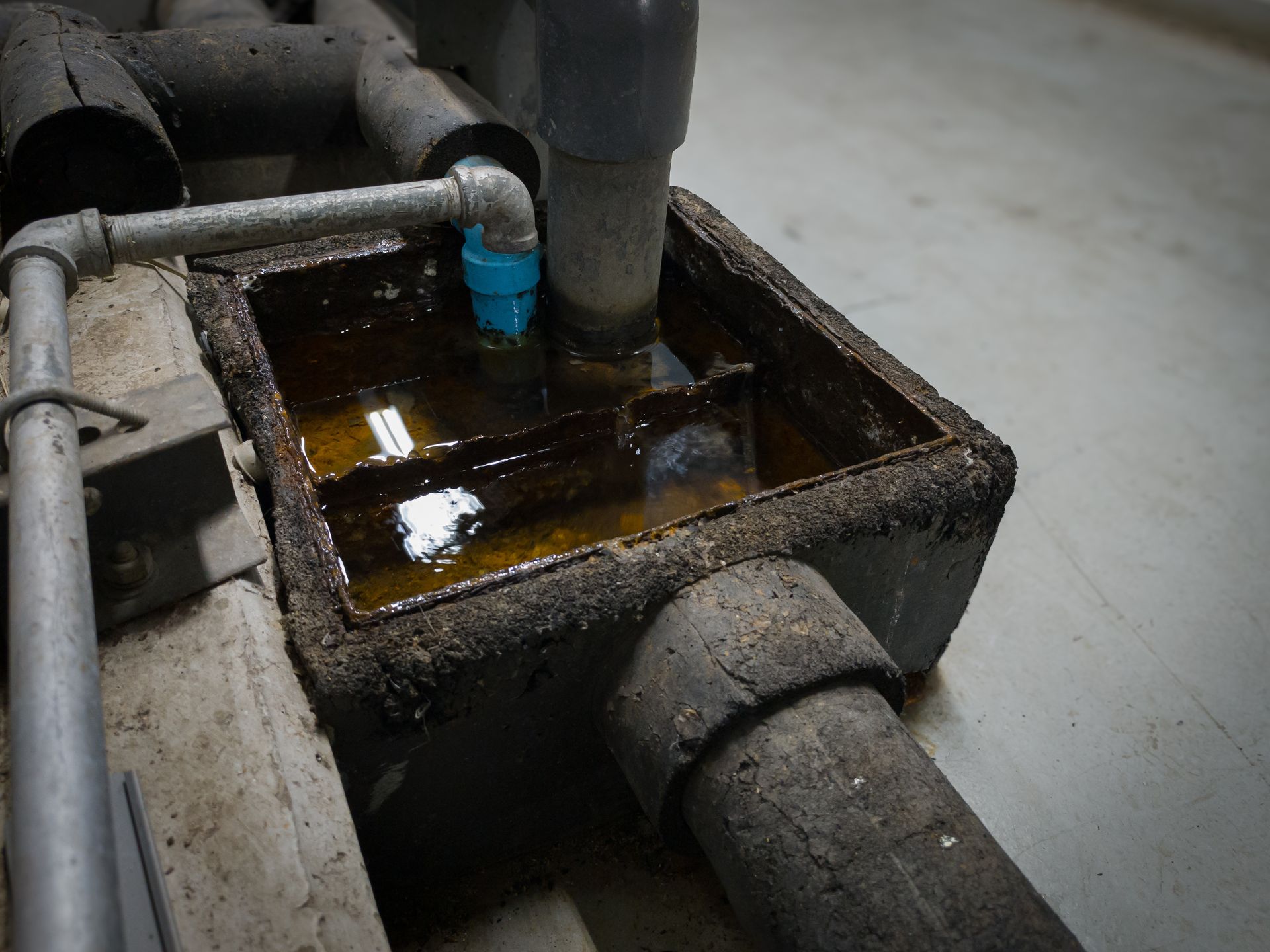 corroded grease trap
