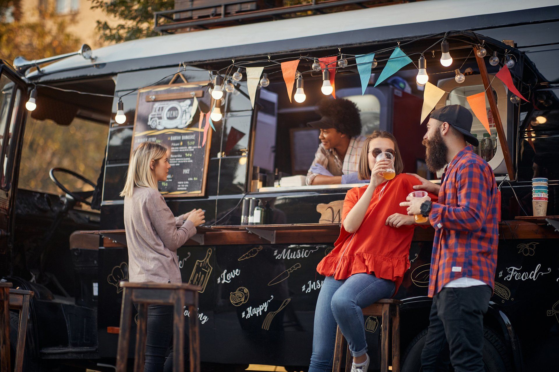 people eating and drinking at a food truck Atlanta, GA