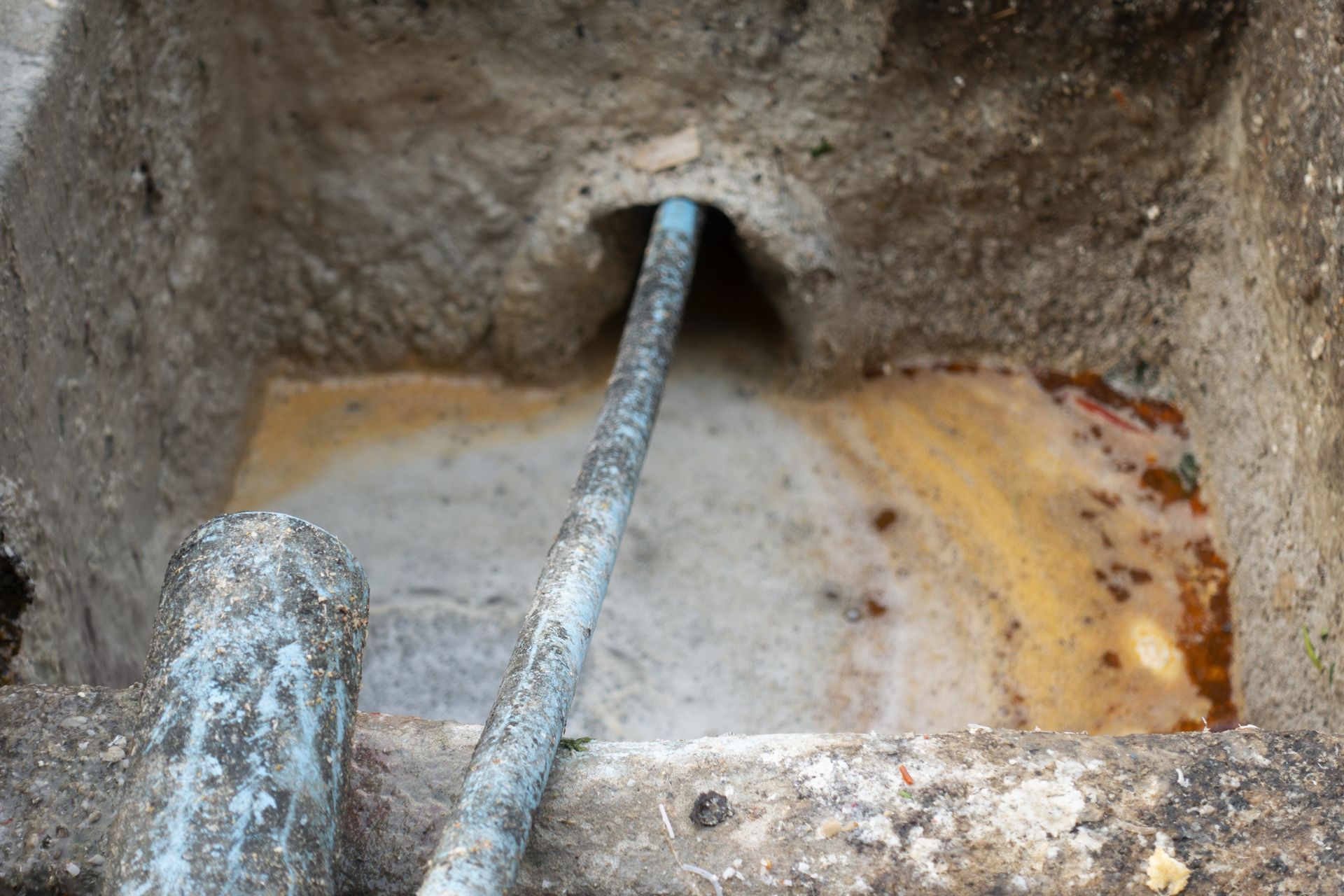 time it takes to clean a grease trap