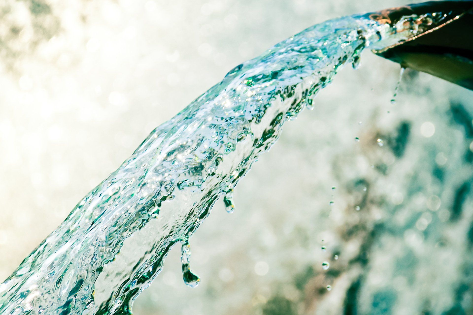 water pouring out of a spout