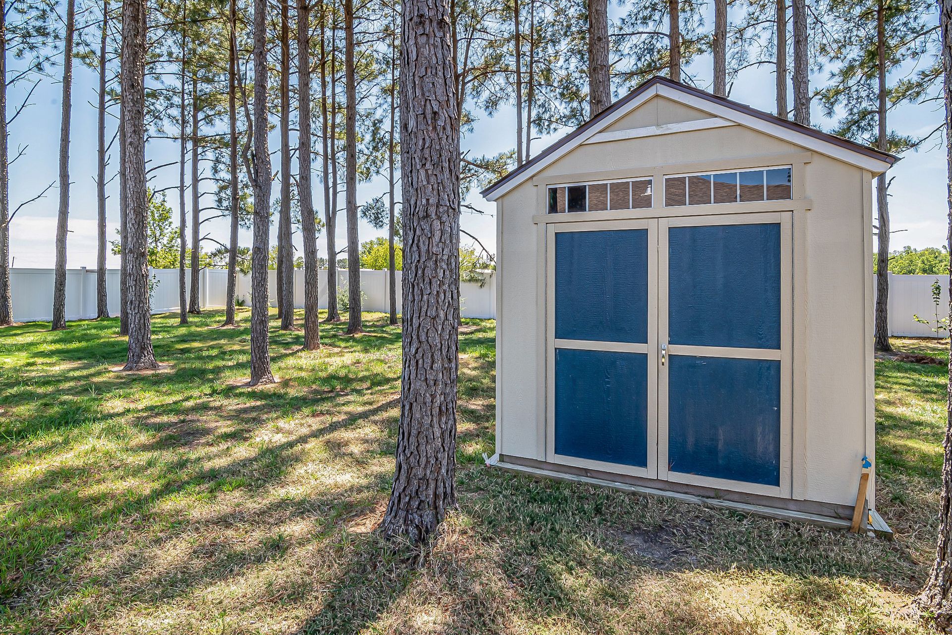 Shed in the backyard of a home that was set up with a crane