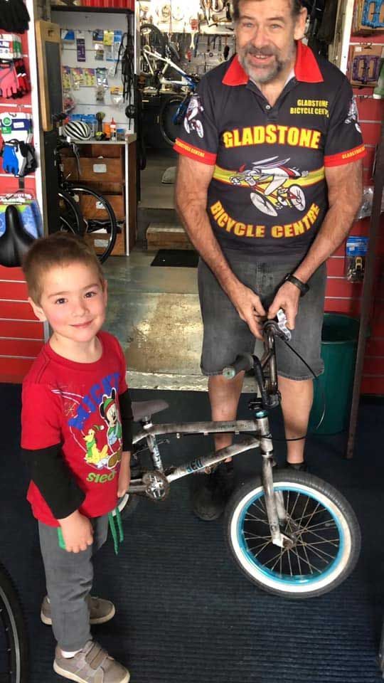 Man and Kid with Bicycle — Gladstone Bicycle Centre in Gladstone, QLD