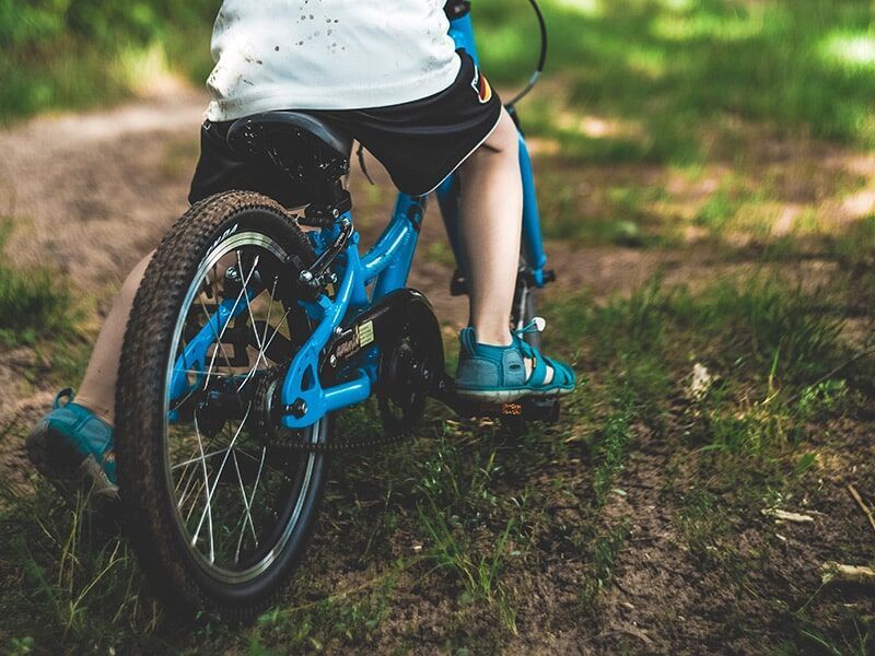 Child Riding A Bicycle — Gladstone Bicycle Centre in Gladstone, QLD